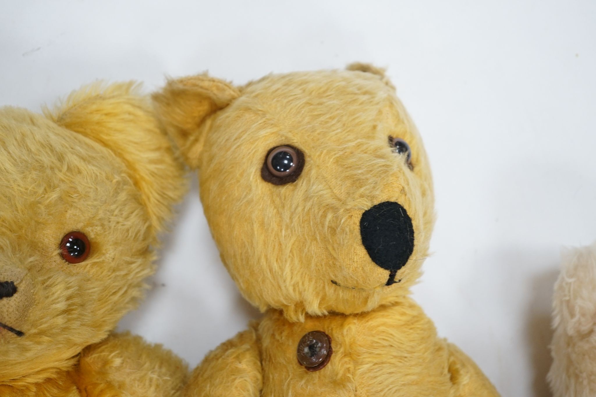 An Irish Bear with label, Erris Toys, 21in., with Pedigree, 22in. and a Wendy Boston, with label, 17in.